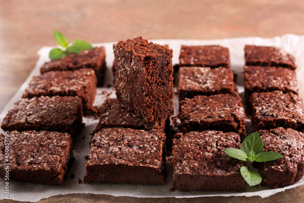 Slices of chocolate cake, brownies Slices of chocolate cake, brownies