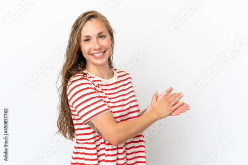 Young caucasian woman isolated on white background applauding