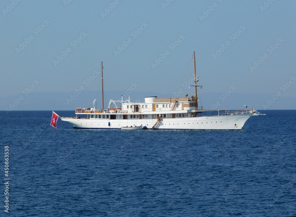 An old luxury yacht off the coast of Glyfada in Attica, Greece