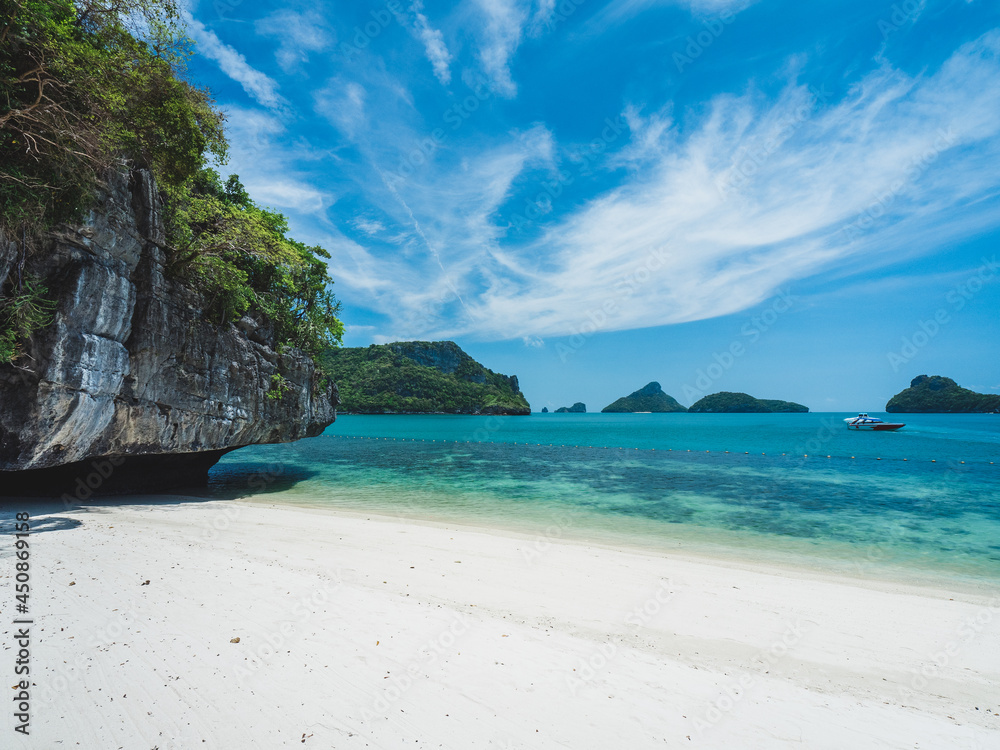 White sand beach rock formation island with turquoise water. Mae Ko Island, Mu Koh Ang Thong, near Samui, Thailand.