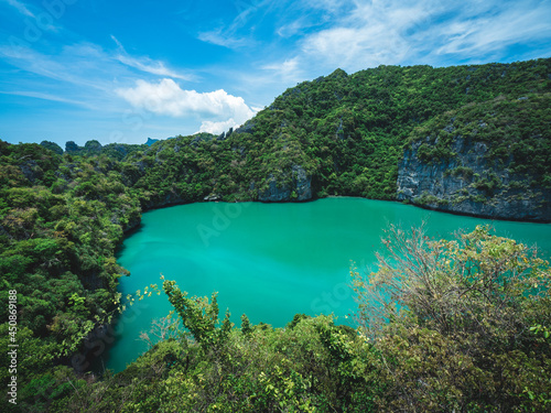 Hidden emerald lagoon in rock formation island. Thale Nai, Mae Ko Island, Mu Koh Ang Thong, near Samui, Thailand.