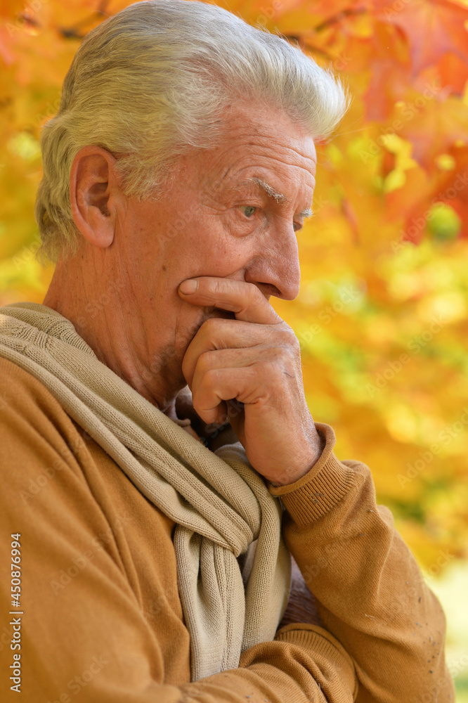 Close up portrait of senior man outdoors Close up portrait of senior man outdoors