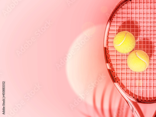 Tennis. Sport composition with yellow tennis balls and racket on a pink background with palm leave shadow and copy space. Evening tennis competition and show. The concept of outdoor game sports