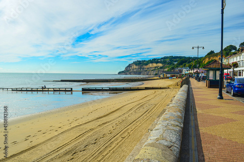 Promenade and sandy beach during summer time at Shanklin beach on the Isle of Wight, UK. photo
