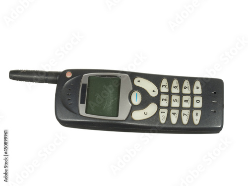 Old worn mobile phone outdated design isolated on white background. Mobile connection.