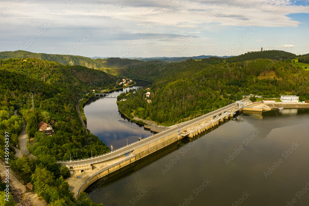 The Orlik Reservoir on Vltava River is largest hydroelectric dam in Czech Republic. Aerial view to important source of sustainable energy in European Union.