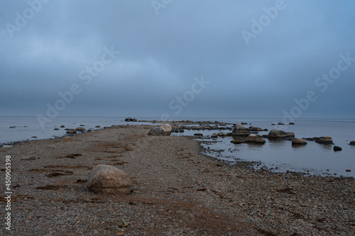 Autumn morning on the shores of Lake Ladoga. Stones and water. High quality photo