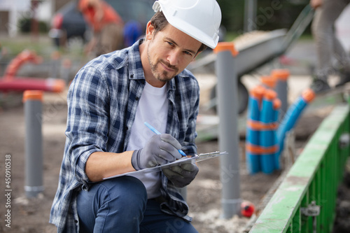 engineer checking preparation of the foundation