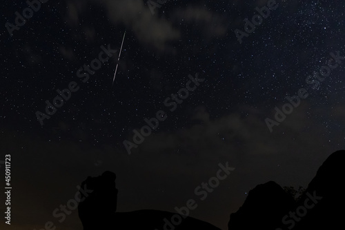 Night landscape with Perseid meteor in Barruecos. Spain. © Eduardo Estellez