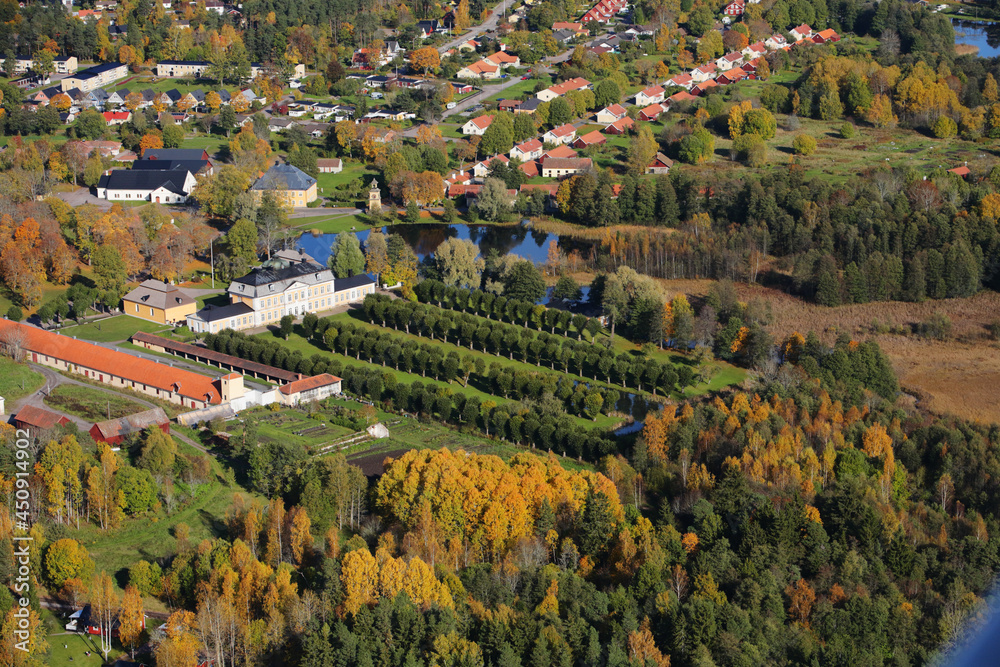 Aerial view of the Swedish village Osterbybruk during the autumn season.