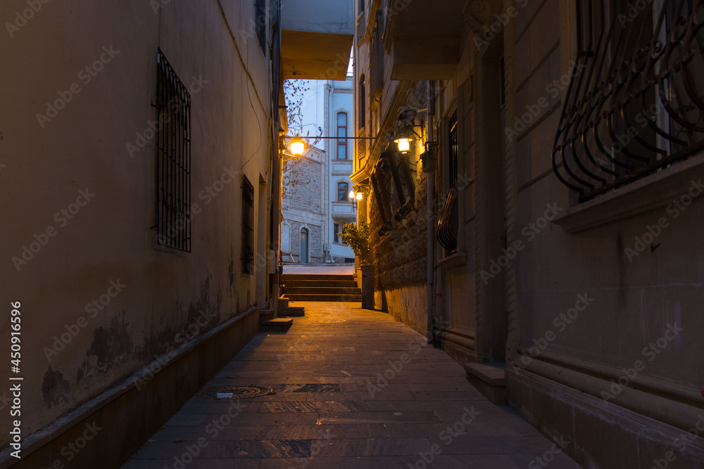 Houses and narrow streets of the old city of Baku. Evening time in the old town of Icherisheher