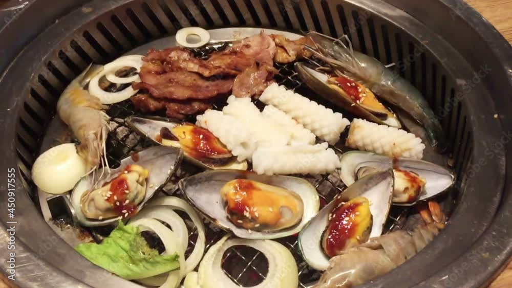 Asian BBQ-Style. sliced meat and grill hot pan Asian BBQ-Style. sliced meat and grill hot pan