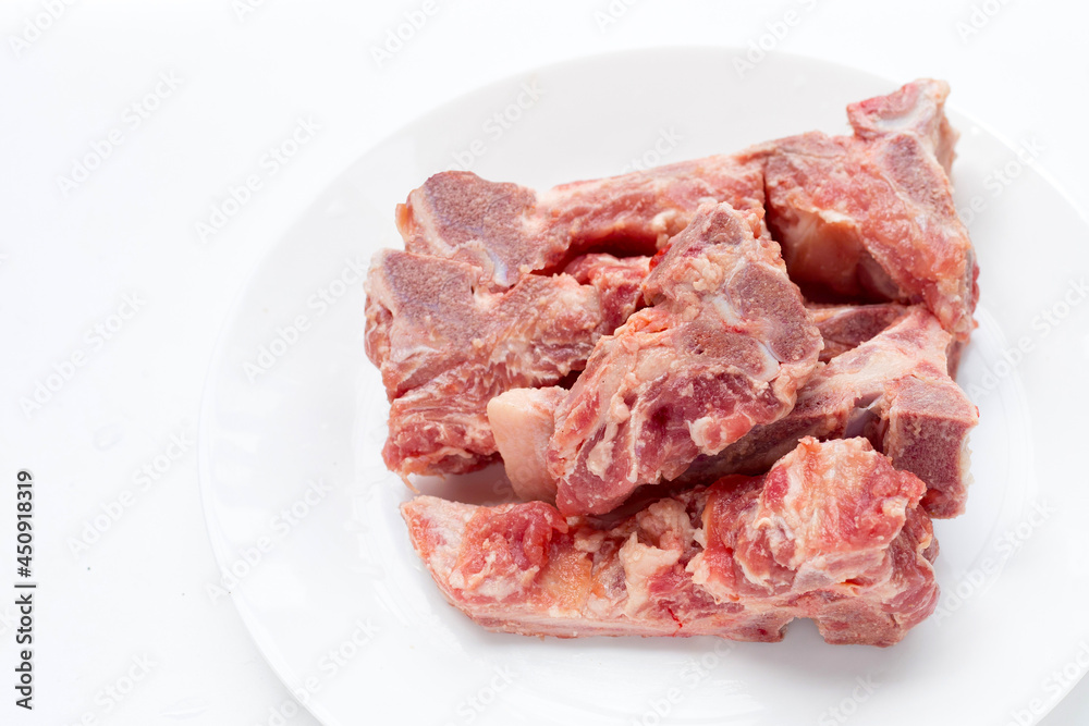 Raw pork bone isolated on white background.