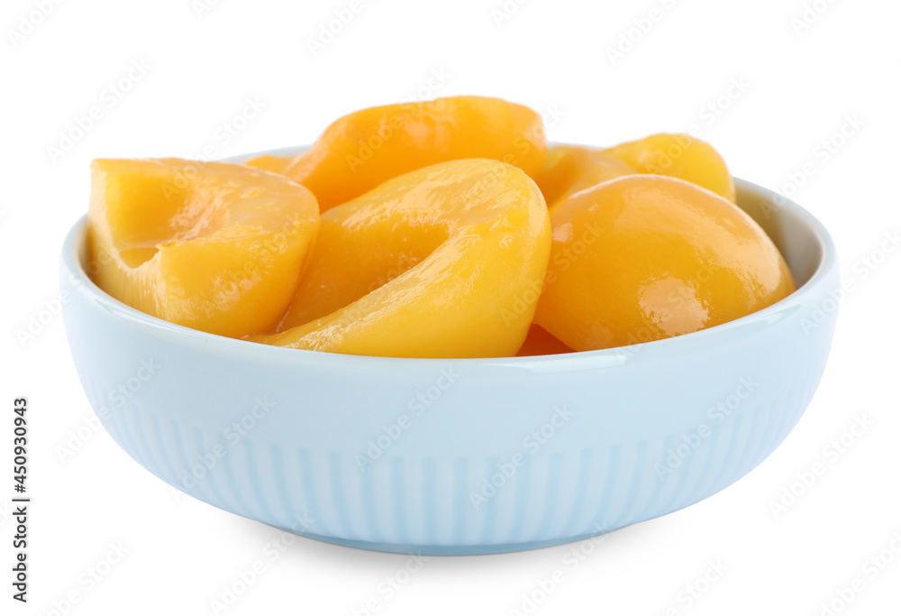 Halves of canned peaches in bowl isolated on white Halves of canned peaches in bowl isolated on white