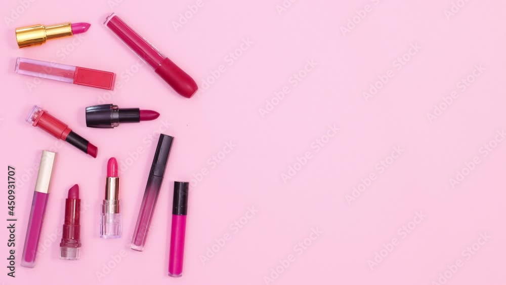 Lipsticks move on pastel pink theme. Stop motion Lipsticks move on pastel pink theme. Stop motion