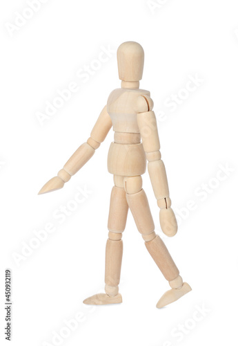 Wooden human model isolated on white. Mini mannequin