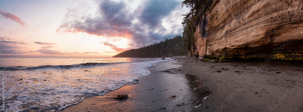 Panoramic View of Mystic Beach on the West Coast of Pacific Ocean. Summer Sunny Sunset. Canadian Nature Landscape Background Panorama. Located near Victoria, Vancouver Island, BC, Canada. Panoramic View of Mystic Beach on the West Coast of Pacific Ocean. Summer Sunny Sunset. Canadian Nature Landscape Background Panorama. Located near Victoria, Vancouver Island, BC, Canada.