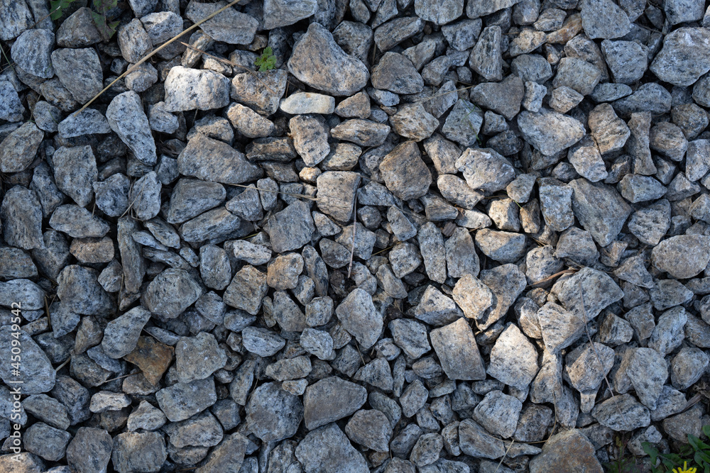 Real backround: grey crushed stones with sunbeam. Real backround: grey crushed stones with sunbeam.