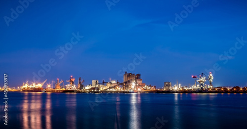 Facilities at Rotterdam Harbor by Night photo