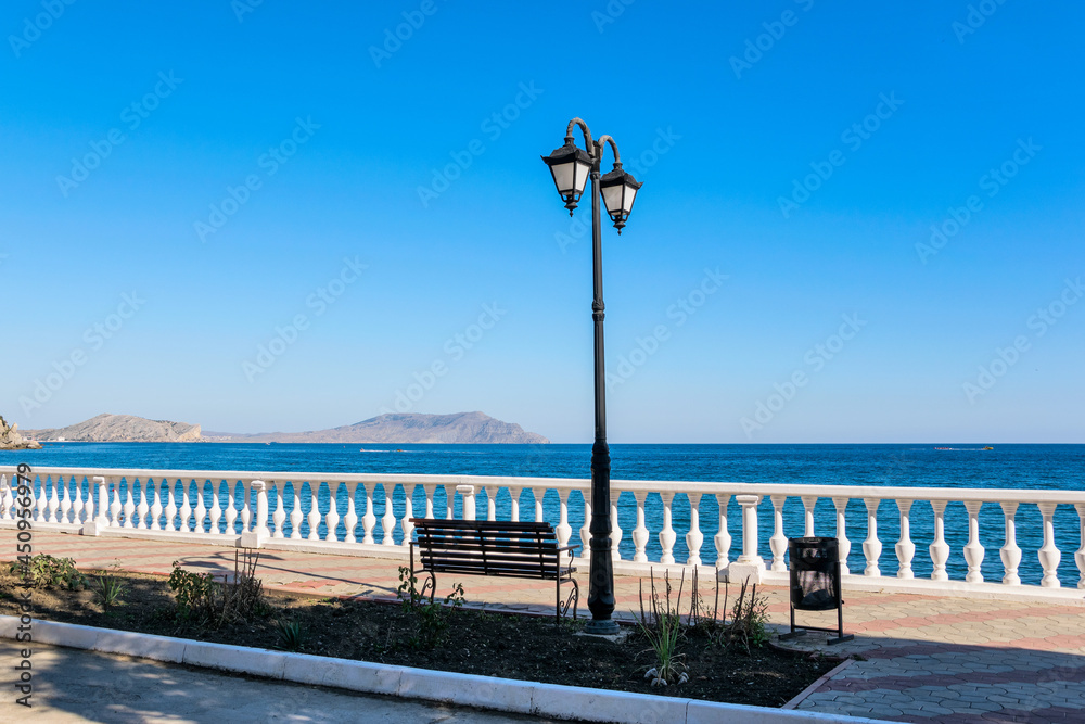 Street lamp and balustrade on the seafront