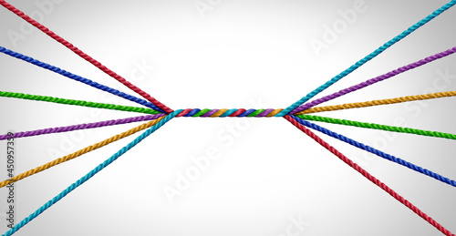 Connecting together and unity teamwork concept as a business metaphor for joining a partnership of diversity as diverse ropes connected together for a corporate symbol for cooperation photo