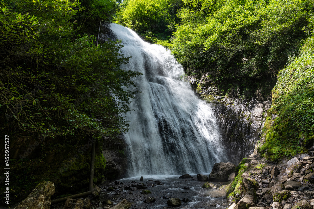 Irina Waterfall in the Republic of Abkhazia. A clear sunny day on May 20, 2021