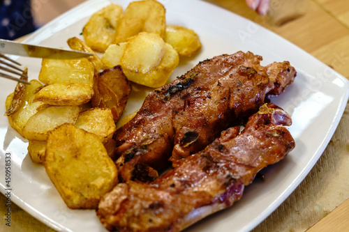 Delicious Homemade Grilled Pork Trotters with French Fries