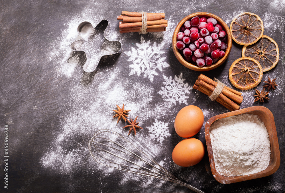 Christmas food. Ingredients for Christmas baking: kitchen utensils, frozen cranberries, eggs, flour Christmas food. Ingredients for Christmas baking: kitchen utensils, frozen cranberries, eggs, flour