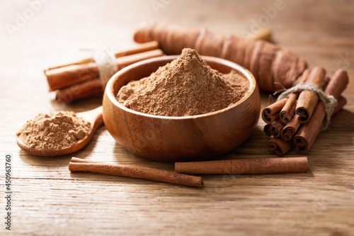 Cinnamon sticks and bowl of cinnamon powder