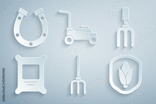 Set Garden pitchfork, rake, Fertilizer bag, Shield corn, Lawn mower and Horseshoe icon. Vector