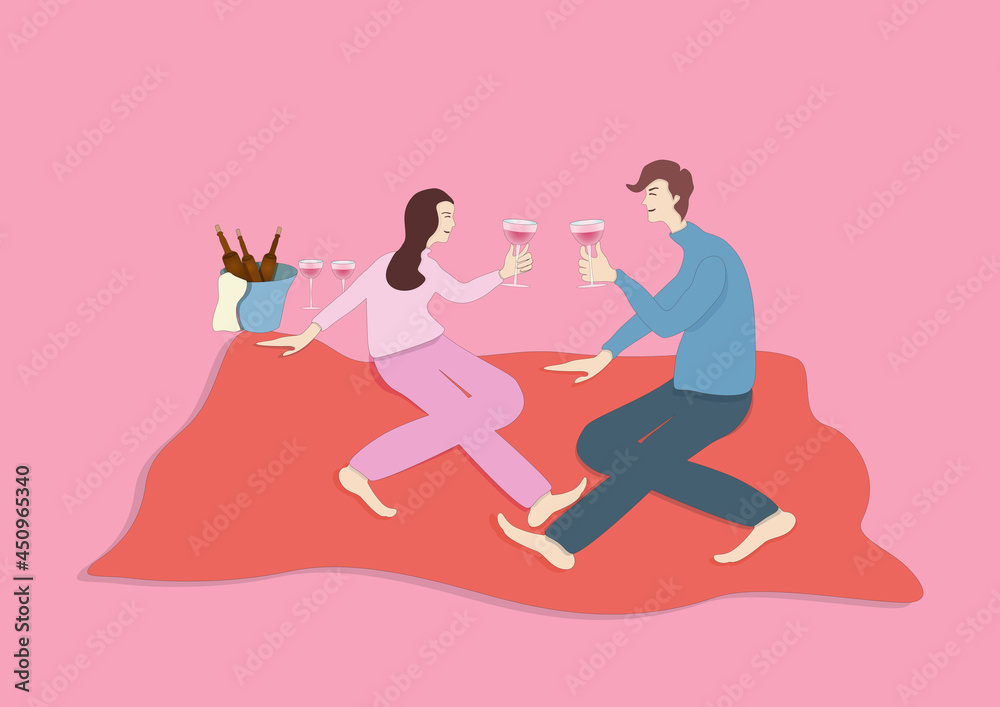 Lovers sitting on a red blanket to raise their glasses Lovers sitting on a red blanket to raise their glasses