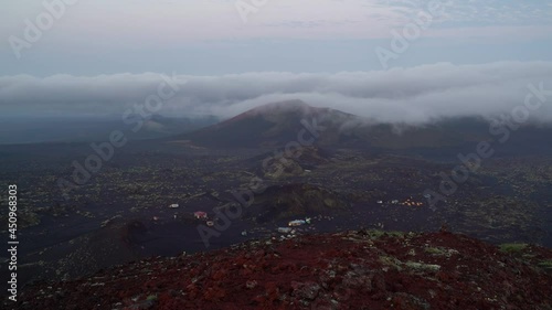 Timelapse video. Russia, Kamchatka. Cloudscape cover over the cones of the Tolbachik volcano.
