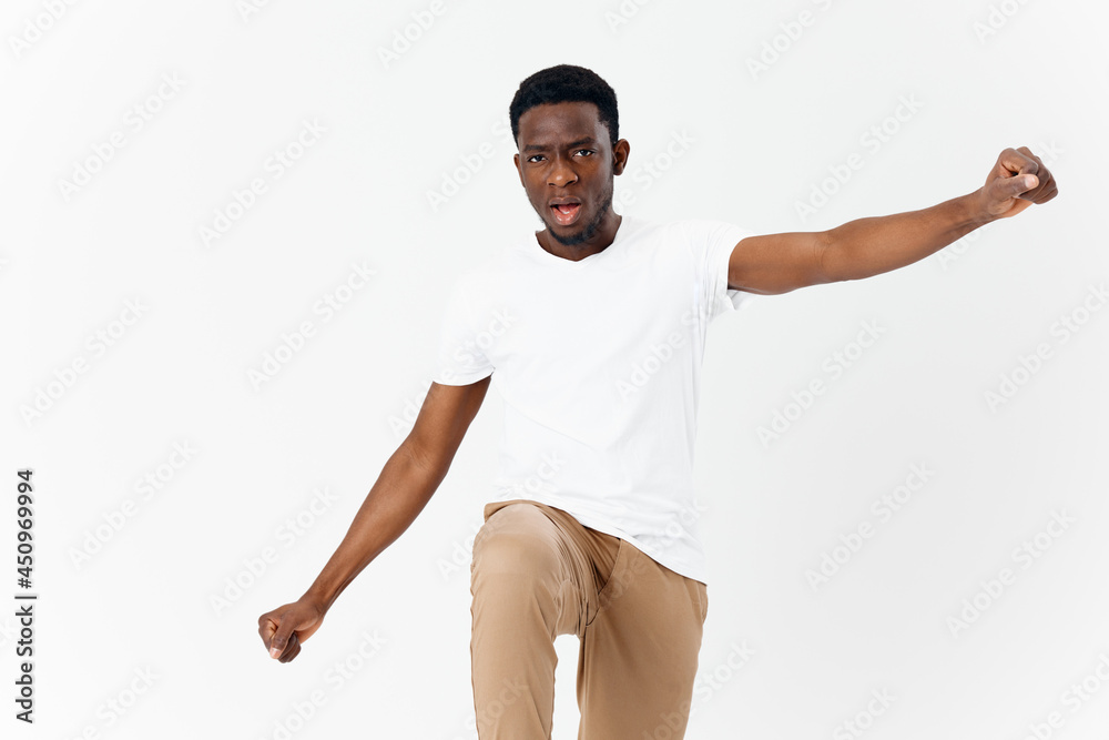 handsome man african appearance emotions gestures hands studio light background handsome man african appearance emotions gestures hands studio light background