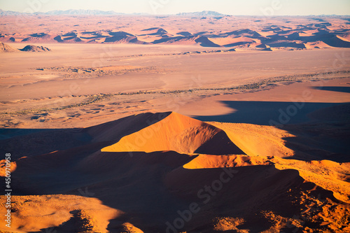 Aerial images of arid regions in Africa  harsh desert environment. Popular tourist destination in Africa  the Namibian desert landscape.