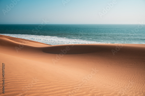 Valokuva Surreal natural landscape of desert and sea