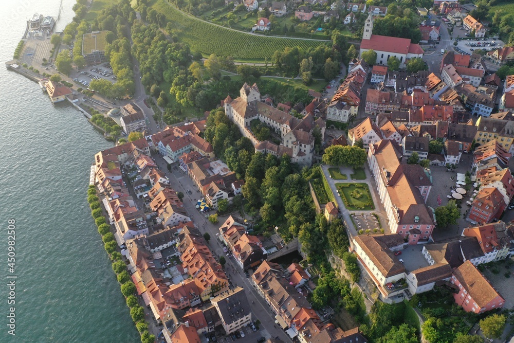 Aerial drone shot of Meersburg at Lake Constance, Bade-Württemberg, Germany while sunset