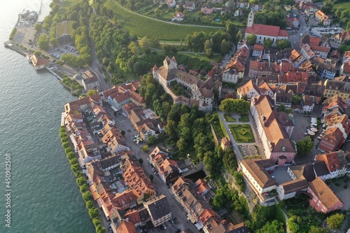 Aerial drone shot of Meersburg at Lake Constance, Bade-Württemberg, Germany while sunset