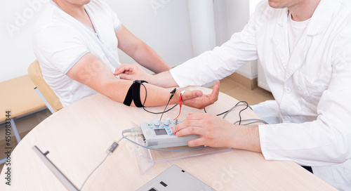 Patient nerves testing using electromyography at medical center © romaset