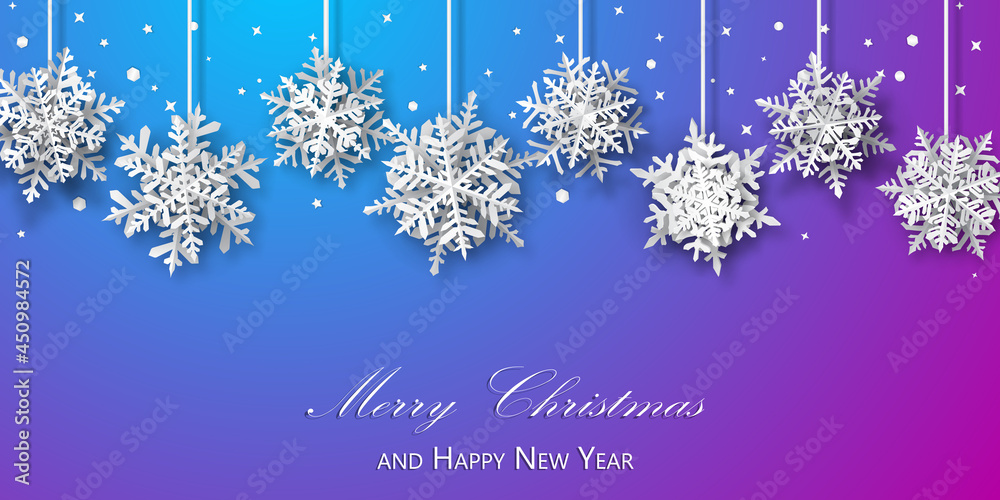 Christmas background of paper snowflakes with soft shadows, white on blue and purple background Christmas background of paper snowflakes with soft shadows, white on blue and purple background