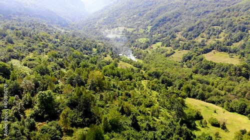 Aerial view to the landscape with a fire . High quality 4k footage of mountain in Bosnia and Herzegovina