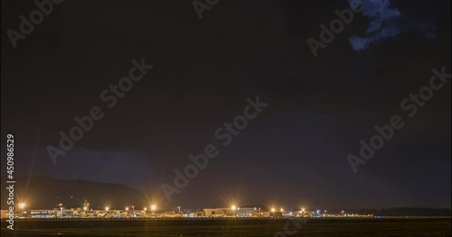 Time lapse of night summer storm over Ljubljana airport, Slovenia. Extreme lightning storm timelapse. Zoom in, wide angle