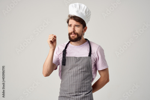 bearded man in chef's uniform professional food industry