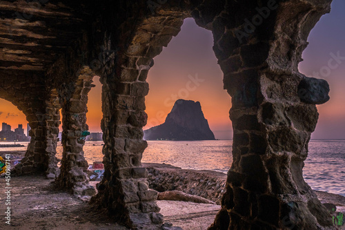 Calpe at sunrise on the Mediterranean coast of Alicante, Spain with views of the Ifach Rock photo