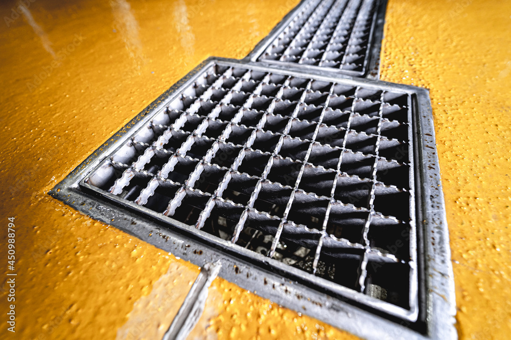 stainless steel floor drain at a modern beer factory stainless steel floor drain at a modern beer factory