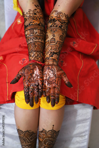 Beautifully Decorated Heena Tattoo. Bride with Mehandi Design. Indian Wedding. © Chander