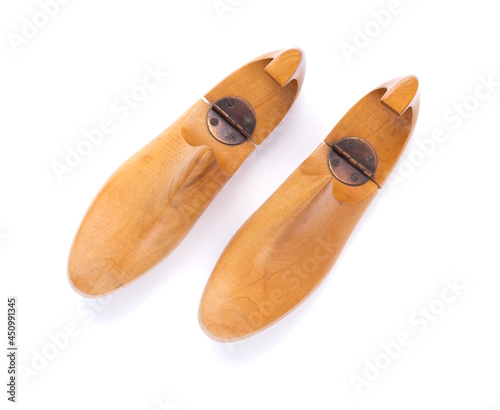 Wooden lasts shoes isolated at white background. Wood last for cobbler
