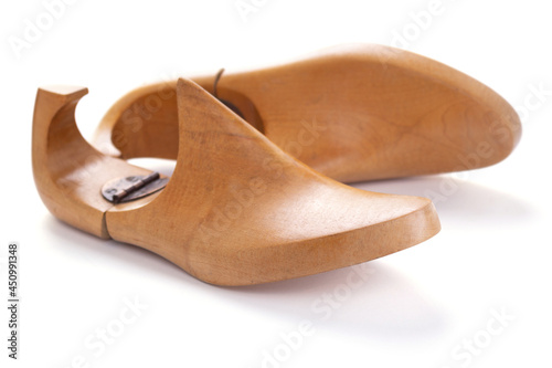 Wooden lasts shoes isolated at white background. Wood last for cobbler