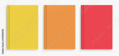 Rectangular vector blank warm colors realistic book cover mockups set, closed organizer or notebook cover template with sheet of A4. Front view of yellow, orange and red notepad with binding mock up