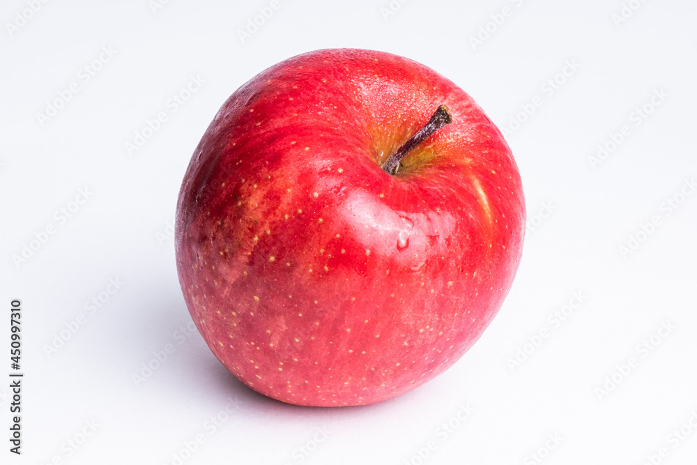 【果物】ヘタがついた赤いリンゴ　
