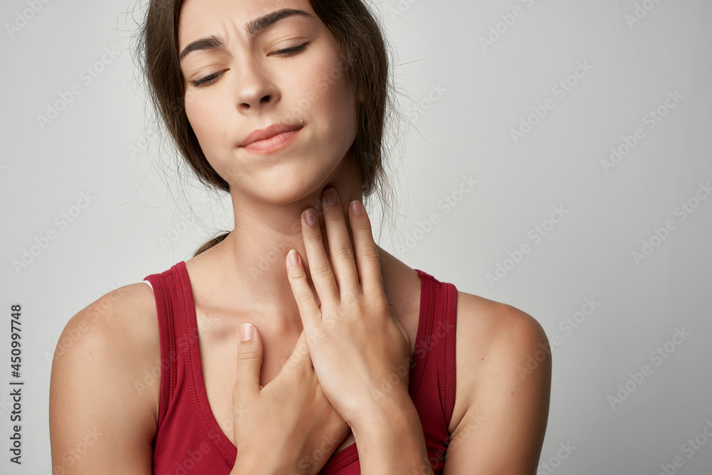 woman in red t-shirt injured finger health problems woman in red t-shirt injured finger health problems